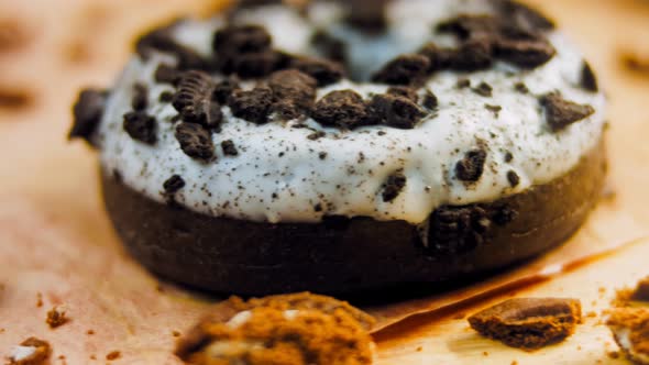 Chocolate Donuts Decorated with Pieces of Oreo Biscuits