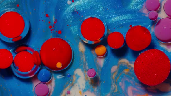 Bubbles Float in Liquid Paint Mixing Ink Oil and Milk Abstract Multicolor Hypnotic Painting