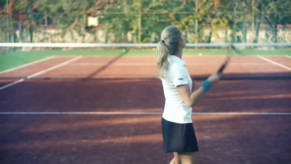 Sport Woman In Sportwear Playing Match. Female Tennis Player Preparing To Set Ready To Serve Ball.