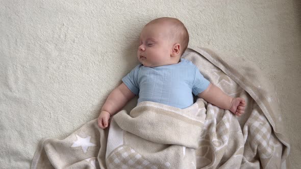 Top View Cute Kid 2 Month Newborn Boy Sweetly Sleeping After Bath Shower On White Soft Bed