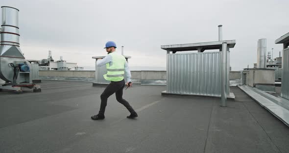 Elastic Charismatic Engineer on the Rooftop of