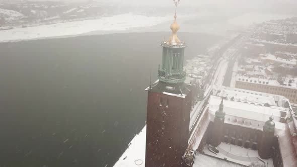 Downward aerial pan and tilt motion of historic landmark in the old charming city of Stockholm,Swede