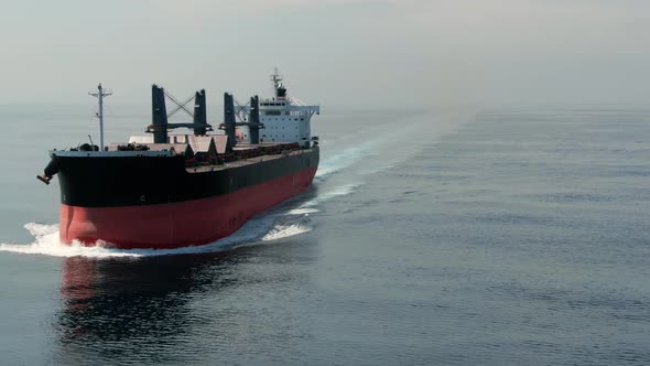 A large ship for transporting bulk cargo across the ocean