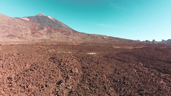 Aerial Filming. Desert in the Mountains Rocks Red Color. Move Back. Canary Islands, Teide Volcano