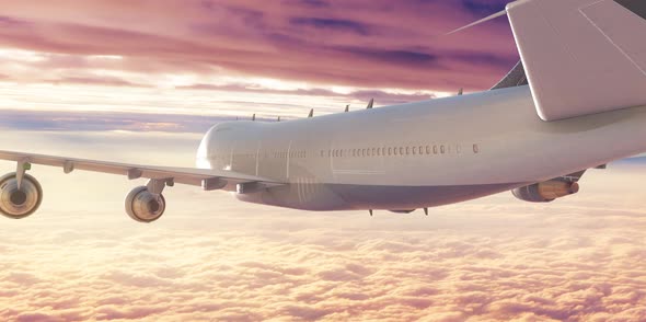 Airplane Flying Above The Clouds