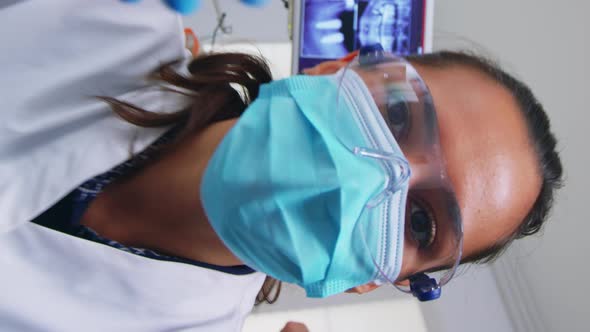 Vertical Video Pov of Dentist Working on Patient Mouth Hygine