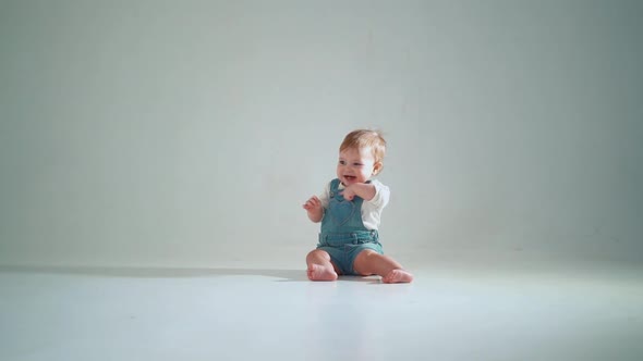 the baby is crawling. studio slow motion