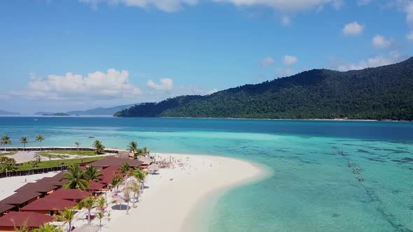 Aerial Top View on Beautiful Blue Ocean Beach with White Sand and Palms