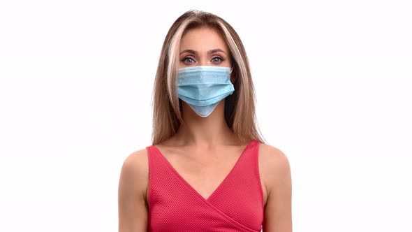 Woman in Medical Mask Shaking Finger Gesture No Disagree