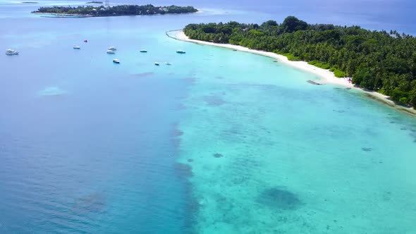 Aerial drone panorama of tourist beach by blue sea and sand background