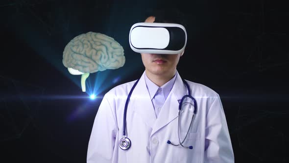 Asian Male Doctor Using VR Glasses Virtual Reality Touching Digital X-Ray Of Human Heart