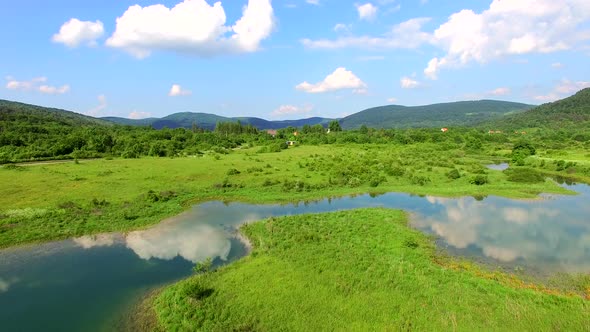 Aerial view of Jesenica river and surrounding in Croatian region Lika.