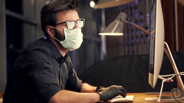 Man In Face Mask Working In Office. Businessman In Mask Protection Epidemic Coronavirus. Conference.