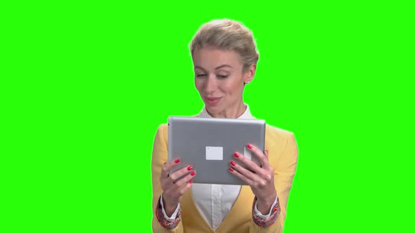 Joyful Business Woman Using Digital Tablet.