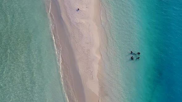 Drone aerial abstract of exotic island beach by blue sea with sand background