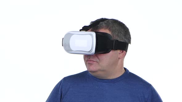 Man Is Looking at 3d Glasses. White Background . Close Up. Slow Motion