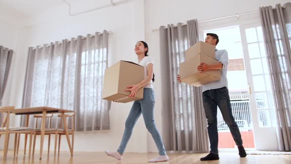 Asian Couple Moving To New House