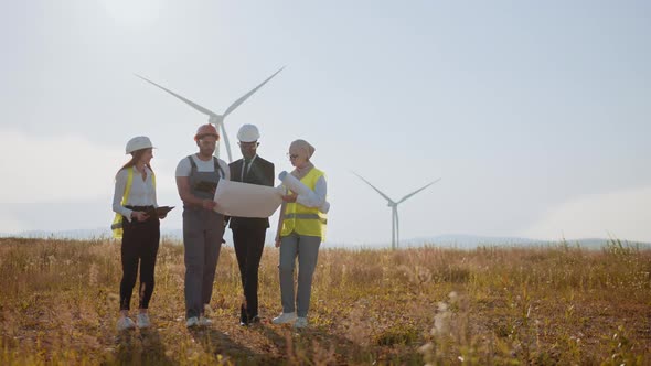 Businessman and Team Exploring the Power Generation Area