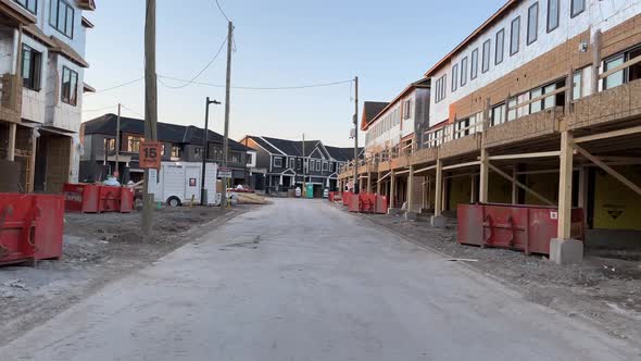 Construction of a new development neighborhood town home community in Canada with foundation, wooden