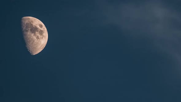 First Quarter Of Moon In Blue Sky Background