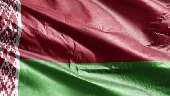 Belarus textile flag waving on the wind. Slow motion. 20 seconds loop.