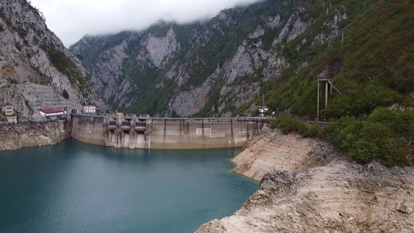 Drone View of Water Dam High in Mountains