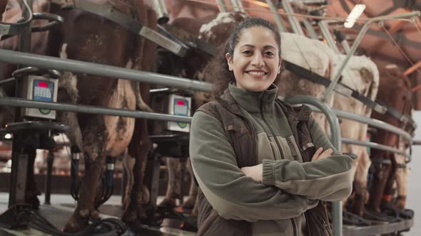 Woman Posing near Carousel Milking Parlor