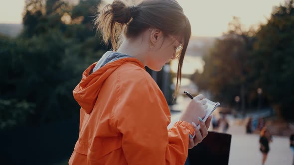 The Ambitious Student Filmed in Profile Notes the Subjects for the Exam