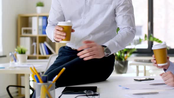 Business Team Drinking Coffee at Office