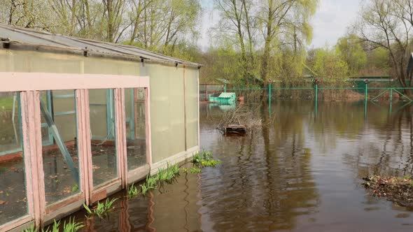 Vegetable Garden Beds In Water During Spring Flood Floodwaters During Natural Disaster