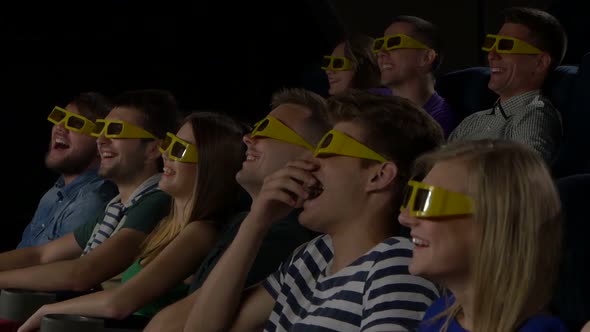 Young People Watch Movies in Cinema: Comedy in 3D. Close Up