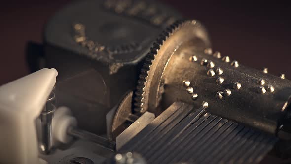 Detail Of An Old Music Box In Motion