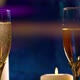 Pouring Two Flutes of Champagne By Candlelight - VideoHive Item for Sale