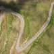 Cars passing through curve in mountain road. Mountain serpentine road - VideoHive Item for Sale