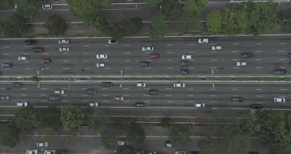 Aerial drone shot of many cars on an avenue of Sao Paulo city, Brazil.