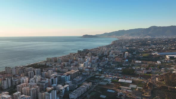 Colorful Panorama sunset over the city Aerial View 4 K Alanya Turkey