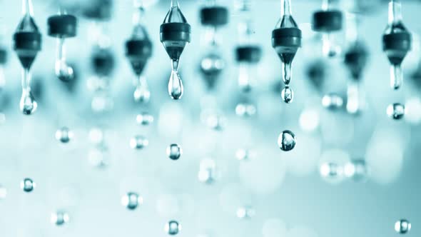 Super Slow Motion Shot of Water Droplets Falling From Shower Head at 1000Fps