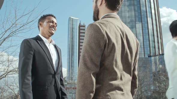 Business Partners in front of Office Center