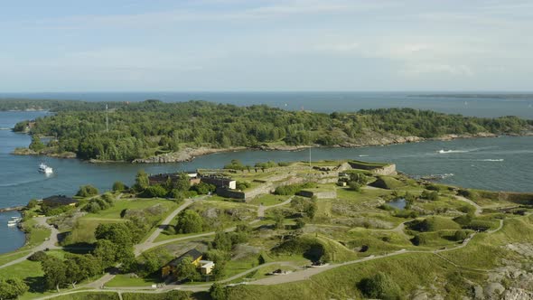 Aerial view overlooking the Kustaanmiekka island, at the Suomenlinna fortress, Vallisaari in the bac