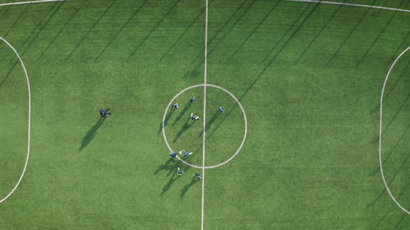 Aerial View of Kids Football Team During Training