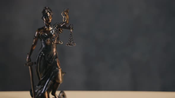 Law and justice concept background with copy space and lady justice statue of scales