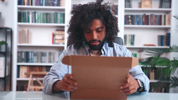 Distressed Indian Man Discouraged By Received Parcel Opens Box and Gets Upset