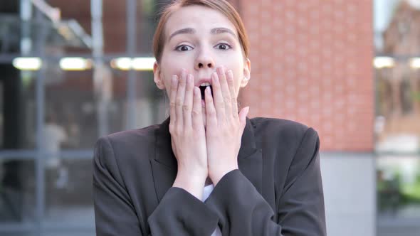 Shocked, Outdoor Wondering Young Businesswoman