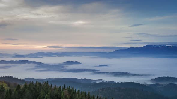 Flowing clouds in the Tatra mountains at sunrise, Poland, Timelapse