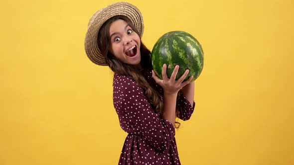 Amazed Kid with Watermelon Fruit on Yellow Background Watermelon