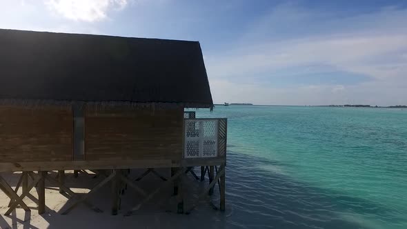 Stunning drone shot near the water villas in the Maldives Full HD