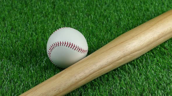 Baseball Bat And Ball On The Field