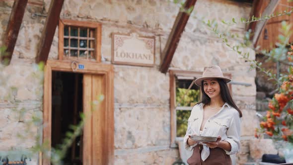 Tourist Woman Looking at Camera