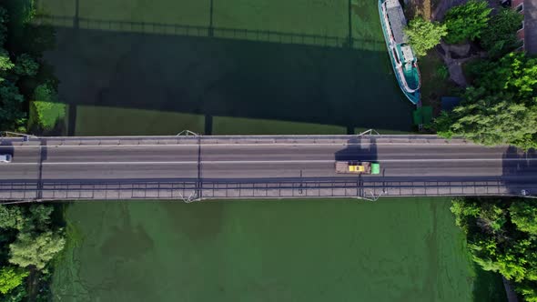 Traffic on the Bridge That Crosses the River