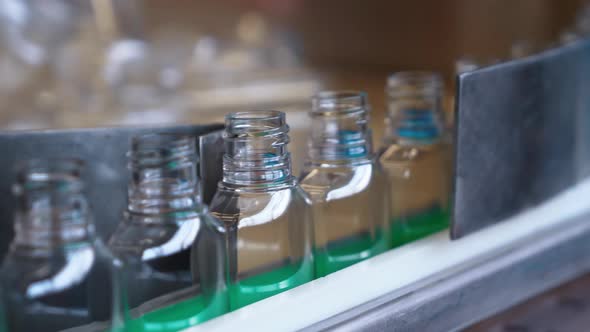 Empty Plastic Bottles for Sanitizers are Moving Along the Conveyorat Factory